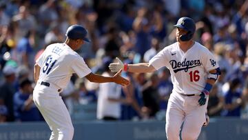 LOS ANGELES, CALIFORNIA - JUNE 24: Will Smith #16 of the Los Angeles Dodgers celebrates his solo homerun with Dino Ebel #91, to take a 1-0 lead over the Houston Astros, during the first inning at Dodger Stadium on June 24, 2023 in Los Angeles, California.   Harry How/Getty Images/AFP (Photo by Harry How / GETTY IMAGES NORTH AMERICA / Getty Images via AFP)