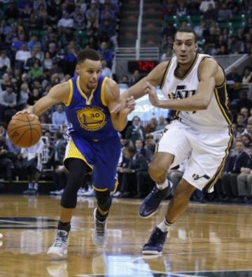 Stephen Curry y Rudy Gobert.