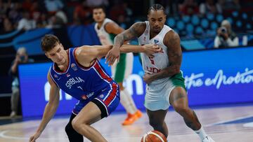 Travante Williams (R) of Portugal and Bogdan Bogdanovic of Serbia in action during the EuroBasket 2025 group phase basketball match between Portugal and Serbia, in Riga, Latvia, 29 August 2025.