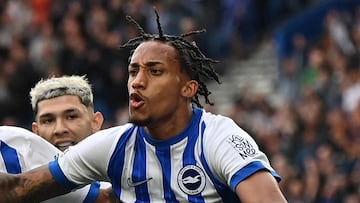 Brighton's Brazilian striker #09 Joao Pedro (R) celebrates scoring the team's second goal with Brighton's French striker #14 Georginio Rutter during the English Premier League football match between Brighton and Hove Albion and Manchester United at the American Express Community Stadium in Brighton, southern England on August 24, 2024. (Photo by Glyn KIRK / AFP) / RESTRICTED TO EDITORIAL USE. No use with unauthorized audio, video, data, fixture lists, club/league logos or 'live' services. Online in-match use limited to 120 images. An additional 40 images may be used in extra time. No video emulation. Social media in-match use limited to 120 images. An additional 40 images may be used in extra time. No use in betting publications, games or single club/league/player publications. /