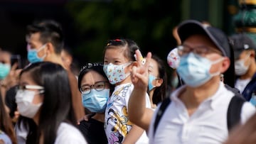 Visitors watch the opening show of the Castle of Magical Dreams at Hong Kong Disneyland Resort, following the coronavirus disease (COVID-19) outbreak in Hong Kong, China November 20, 2020. REUTERS/Lam Yik