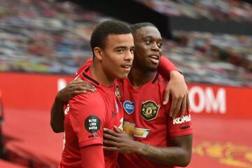 Manchester United's Mason Greenwood celebrates with Aaron Wan-Bissaka