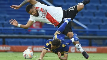 BUENOS AIRES, ARGENTINA - MARCH 14: Paulo D&iacute;az of River Plate makes a foul to Nicol&aacute;s Capaldo of Boca Juniors after which referee sanctions a penalty during a match between Boca Juniors and River Plate as part of Copa De La Liga Profesional 