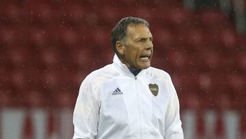 Miguel Angel Russo of Argentina's Boca Juniors instructs his players during a Copa Libertadores round of sixteen first leg soccer match at the Beira-Rio stadium in Porto Alegre, Brazil, Wednesday, Dec. 2, 2020. (Diego Vara/Pool via AP)