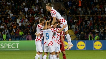 Croatia's forward Andrej Kramaric (C) celebrates with teammates after scoring his team's first goal during the UEFA EURO 2024 qualifying football match between Armenia and Croatia at the Vazgen Sargsyan Republican Stadium in Yerevan, on September 11, 2023. (Photo by KAREN MINASYAN / AFP)