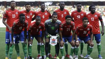 Gambia players pose for photographers before the start of the African Cup of Nations 2022 quarter-final soccer match between Gambia and Cameroon at the Japoma Stadium in Douala, Cameroon, Saturday, Jan. 29, 2022. (AP Photo/Sunday Alamba)