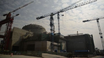 (FILES) This file photo taken on December 8, 2013 shows a view of the joint Sino-French Taishan Nuclear Power Station being built outside the city of Taishan in Guangdong province. - French nuclear firm Framatome said on June 14, 2021 it was working to resolve a "performance issue" at the plant it part-owns in China's southern Guangdong province following a US media report of a potential leak there. (Photo by PETER PARKS / AFP)