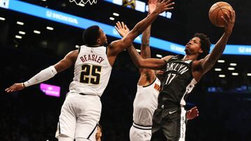 Feb 6, 2019; Brooklyn, NY, USA;  Brooklyn Nets forward Ed Davis (17) shoots against Denver Nuggets guard Malik Beasley (25) during the second half at Barclays Center. Mandatory Credit: Andy Marlin-USA TODAY Sports