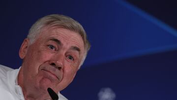 Real Madrid's Italian coach Carlo Ancelotti gives a press conference on the eve of their UEFA Champions League quarter final first leg football match against Manchester City at the Real Madrid Sport City in Valdebebas, on the outskirts of Madrid on April 8, 2024. (Photo by PIERRE-PHILIPPE MARCOU / AFP)