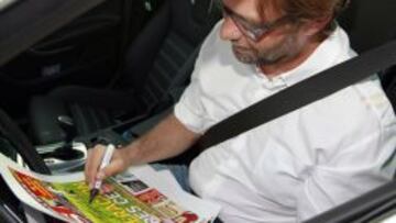 Klopp plasma su firma en una portada de AS.