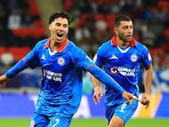 Soccer Football - FIFA Intercontinental Cup - Derby of the Americas - Cruz Azul v Flamengo - Ahmad Bin Ali Stadium, Al-Rayyan, Qatar - December 10, 2025 Cruz Azul's Jorge Sanchez celebrates scoring their first goal with Cruz Azul's Erik Lira REUTERS/Thaier Al-Sudani