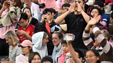 Fans react after not seeing Inter Miami's Argentine forward Lionel Messi play after the friendly football match between Hong Kong XI and US Inter Miami CF in Hong Kong on February 4, 2024. Inter Miami were booed off the pitch after their injured superstar Lionel Messi failed to take the field in a pre-season friendly in Hong Kong. (Photo by Peter PARKS / AFP)