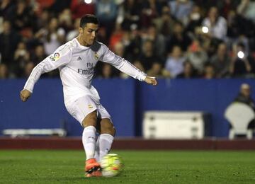 Real Madrid's Cristiano Ronaldo shoots to score a penalty.