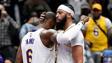 WASHINGTON, DC - DECEMBER 04: Anthony Davis #3 and LeBron James #6 of the Los Angeles Lakers celebrate after a 130-119 victory against the Washington Wizards at Capital One Arena on December 04, 2022 in Washington, DC. NOTE TO USER: User expressly acknowledges and agrees that, by downloading and or using this photograph, User is consenting to the terms and conditions of the Getty Images License Agreement.   Greg Fiume/Getty Images/AFP (Photo by Greg Fiume / GETTY IMAGES NORTH AMERICA / Getty Images via AFP)