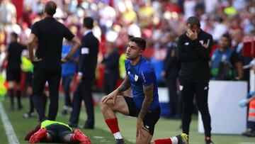 Núñez y Ferreira lamentan la derrota en el Pizjuán.