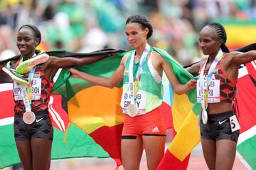 EUGENE, OREGON - JULY 16: Bronze medalist Margaret Chelimo Kipkemboi of Team Kenya, gold medalist Letesenbet Gidey of Team Ethiopia and silver medalist Hellen Obiri of Team Kenya pose for a photo following the Women’s 10,000 Meter Final on day two of the World Athletics Championships Oregon22 at Hayward Field on July 16, 2022 in Eugene, Oregon. (Photo by Carmen Mandato/Getty Images)