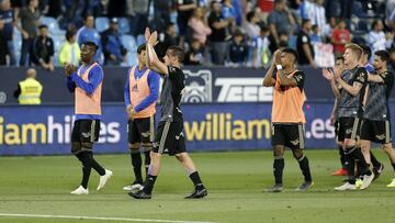 Jugadores del Oviedo tras perder ante el Málaga