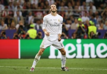 Bale celebrates scoring during the penalty shootout.