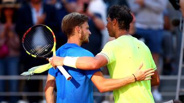 PARIS, FRANCE - MAY 31: Rafael Nadal of Spain shakes hands with David Goffin of Belgium after their mens singles third round match during Day six of the 2019 French Open at Roland Garros on May 31, 2019 in Paris, France. (Photo by Clive Brunskill/Getty Images)