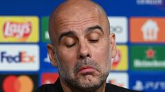 Manchester City's Spanish manager Pep Guardiola addresses a press conference on the eve of the UEFA Champions League quarter-final, second leg football match between Bayern Munich and Manchester City in Munich, southern Germany on April 18, 2023. (Photo by CHRISTOF STACHE / AFP)