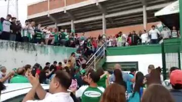 Chapecoense fans converge to pray for their team