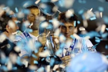 Saja y Diego Milito.