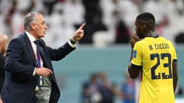 Ecuador's Argentinian coach #00 Gustavo Alfaro speaks with Ecuador's midfielder #23 Moises Caicedo during the Qatar 2022 World Cup Group A football match between Qatar and Ecuador at the Al-Bayt Stadium in Al Khor, north of Doha on November 20, 2022. (Photo by Raul ARBOLEDA / AFP) (Photo by RAUL ARBOLEDA/AFP via Getty Images)