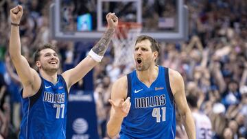 Apr 9, 2019; Dallas, TX, USA; Dallas Mavericks forward Dirk Nowitzki (41) and forward Luka Doncic (77) celebrate during the game against the Phoenix Suns at the American Airlines Center. Mandatory Credit: Jerome Miron-USA TODAY Sports