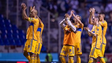 Guido Pizarro, Marcelo Flores of Tigres during the 13th round match between Puebla and Tigres UANL as part of the Torneo Clausura 2024 Liga BBVA MX at Cuauhtemoc Stadium on March 29, 2024 in Puebla, Puebla, Mexico.