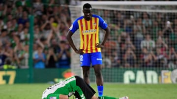 Real Betis' Spanish midfielder Joaquin kisses the lawn as he leaves the pitch to be substituted during the Spanish league football match between Real Betis and Valencia CF at the Benito Villamarin stadium in Seville on June 4, 2023. (Photo by CRISTINA QUICLER / AFP)