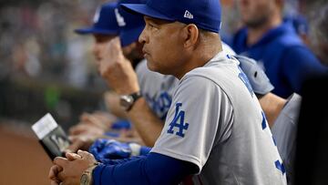 PHOENIX, ARIZONA - OCTOBER 11: Manager Dave Roberts of the Los Angeles Dodgers looks on from the dugout in the first inning against the Arizona Diamondbacks during Game Three of the Division Series at Chase Field on October 11, 2023 in Phoenix, Arizona.   Norm Hall/Getty Images/AFP (Photo by Norm Hall / GETTY IMAGES NORTH AMERICA / Getty Images via AFP)