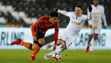 Soccer Football - FA Cup Third Round Replay - Swansea City vs Wolverhampton Wanderers - Liberty Stadium, Swansea, Britain - January 17, 2018   Swansea City&#039;s Roque Mesa in action with Wolverhampton Wanderers&#039; Morgan Gibbs-White      Action Image