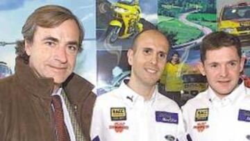 <b>CON EL CAMPEÓN. </b>Sainz, a la izquierda, junto a Xavier Amigo, el copiloto de Sola, y el propio Dani.
