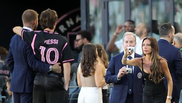 English fashion designer Victoria Beckham (R) takes pictures of her son and her husband Inter Miami's co-owner and former British football player David Beckham (L) during the Leagues Cup Group J football match between Inter Miami CF and Cruz Azul at DRV PNK Stadium in Fort Lauderdale, Florida, on July 21, 2023. (Photo by Chris Arjoon / AFP)