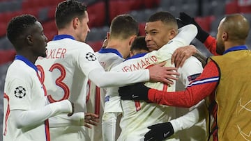 Paris Saint-Germain's French forward Kylian Mbappe (2nd R) celebrates scoring the 2-3 goal with his team-mates during the UEFA Champions League quarter-final first leg football match between FC Bayern Munich and Paris Saint-Germain (PSG) in Munich, s