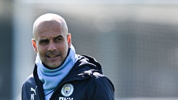 Manchester City's Spanish manager Pep Guardiola attends a team training session at Manchester City training ground in Manchester, north-west England on April 18, 2023, on the eve of their UEFA Champions League quarter-final second leg football match against Bayern Munich. (Photo by Paul ELLIS / AFP)