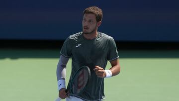 MASON, OHIO - AUGUST 14: Pablo Carreno Busta of Spain reacts after winning a game during his match against Sebastian Korda of the United States during Day 4 of the Cincinnati Open at the Lindner Family Tennis Center on August 14, 2024 in Mason, Ohio. Dylan Buell/Getty Images/AFP (Photo by Dylan Buell / GETTY IMAGES NORTH AMERICA / Getty Images via AFP)