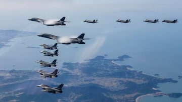 UNDISCLOSED LOCATION, SOUTH KOREA- NOVEMBER 19: In this handout image released by the South Korean Defense Ministry, Two U.S. B-1B Lancer strategic bombers, four U.S. Air Force F-16 fighter jets and four South Korean Air Force F-35 fighter jets fly over South Korea during the joint air drills in response to North Korea's intercontinental ballistic missile (ICBM) launch on November 19, 2022 at an undisclosed location in South Korea. South Korea and the United States conducted a joint air drills focusing on enhancing the capabilities of striking North Korea's missile-related facilities, a day after it fired ICBM. (Photo by South Korean Defense Ministry via Getty Images)