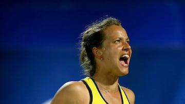 Barbora Strycova celebrates a point against Caroline Garcia. 