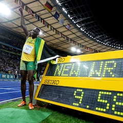 What is the 100m, 200m and 400m track and field Olympic and world record?
