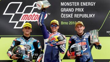 Motorcycling - Moto3 - Czech Republic Grand Prix - Brno, Czech Republic - August 5, 2018   Del Conca Gresini Moto3&#039;s Fabio Di Giannantonio (C) celebrates winning the race on the podium with runner up Estrella Galicia 0,0&#039;s Aron Canet (R) and thi