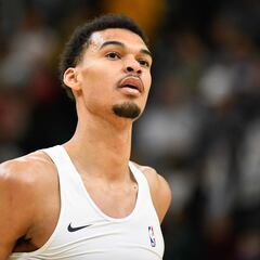 Who were the four NBA players to have a quadruple-double in a game?