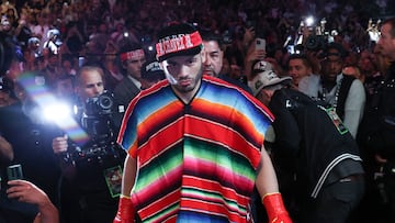 (FILES) Mexico's Julio Cesar Chavez Jr. arrives for his cruiserweight boxing match against USA's Jake Paul at the Honda Center in Anaheim, California, on June 28, 2025. The United States extradited Mexican boxer Julio C�sar Ch�vez Jr. to Mexico after he was arrested in Los Angeles and accused of links to drug trafficking, the National Detention Registry reported on August 19, 2025. (Photo by Patrick T. Fallon / AFP)