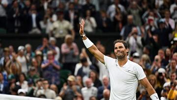 Spain's Rafael Nadal celebrates winning against Italy's Lorenzo Sonego at the end of their men's singles tennis match on the sixth day of the 2022 Wimbledon Championships at The All England Tennis Club in Wimbledon, southwest London, on July 2, 2022. (Photo by SEBASTIEN BOZON / AFP) / RESTRICTED TO EDITORIAL USE