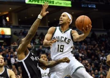 Jerryd Bayless y Thomas Robinson.