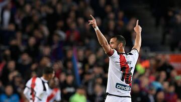 Rayo Vallecano&#039;s Spanish defender Jordi Amat celebrates after Rayo Vallecano&#039;s Spanish forward Raul de Tomas scored a goal during the Spanish league football match between FC Barcelona and Rayo Vallecano de Madrid at the Camp Nou stadium in Barc