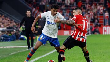 Soccer Football - Copa del Rey - Quarter Final - Athletic Bilbao v FC Barcelona - San Mames, Bilbao, Spain - January 24, 2024 FC Barcelona's Lamine Yamal in action with Athletic Bilbao's Yuri Berchiche REUTERS/Vincent West