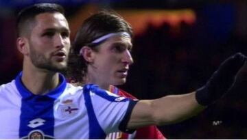 Deportivo striker Florin Andone (left) pleas with ultras at Riazor to stop their chants after Torres' head injury.