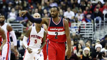 John Wall celebra un triple.