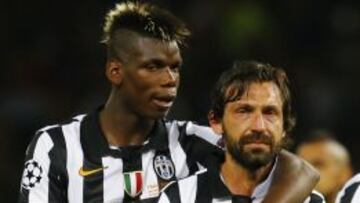 Paul Pogba y Andrea Pirlo, durante un partido con la Juventus.